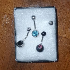 3 belly button rings silver stainless. Extra ball.